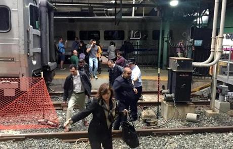 HOBOKEN, NJ - SEPTEMBER 29: Passengers rush to safety after a NJ Transit train crashed in to the platform at the Hoboken Terminal September 29, 2016 in Hoboken, New Jersey. (Photo by Pancho Bernasconi/Getty Images)

