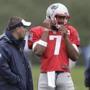 New England Patriots quarterback Jacoby Brissett (7) adjusts his helmet while speaking with offensive coordinator Josh McDaniels, left, during an NFL football team practice Wednesday, Sept. 28, 2016, in Foxborough, Mass. (AP Photo/Steven Senne)