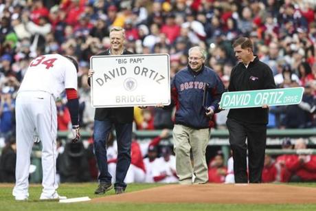 Governor Charlie Baker and Boston Mayor Marty Wash presented David Ortiz with street signs at Fenway.
