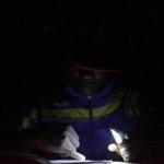 A man at a shelter in Les Cayes, Haiti, used the light from his cellphone to read the Bible.