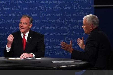 Democratic candidate for Vice President Tim Kaine (L) and Republican candidate for Vice President Mike Pence gesture during the vice presidential debate at Longwood University in Farmville, Virginia on October 4, 2016. / AFP PHOTO / Jewel SAMADJEWEL SAMAD/AFP/Getty Images
