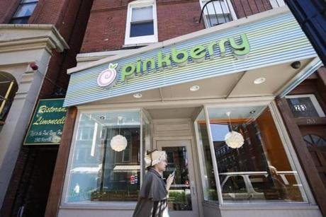 Boston, MA - 10/5/2016 - Passersby walk in front of the recently closed Pinkberry location on Hanover Street in Boston, MA, October 5, 2016. (Keith Bedford/Globe Staff)
