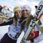 FILE - In this Dec. 8, 2012, file photo, Lindsey Vonn, right, celebrates with third-placed Julia Mancuso after winning an alpine ski, women's World Cup super-G, in St. Moritz, Switzerland. Vonn to snowboarders: Stay off my mountain. Mancuso to Vonn: Speak for yourself. A social-media tiff flared up Thursday, Oct. 6, 2016, between two of the worldâ??s best-known skiers, even if the topic they are arguing over may be a bit stale. (AP Photo/Giovanni Auletta, File)