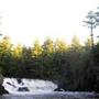 Sunrise on the East Branch of the Penobscot River in Katahdin Woods and Waters in northern Maine.