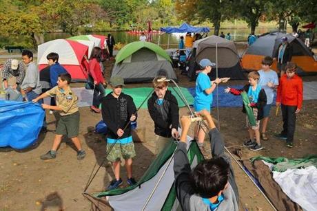 Boston-10/08/2016- SOAR 2016, the largest urban boyscout campout is taking place for two night along the Charles River on Soldiers Field Road. Troop 49 from Beverly sets up their tents. Globe staff photo by John Tlumacki(metro)
