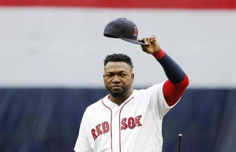 Boston Red Sox's David Ortiz tips his cap to the crowd during ceremonies before a baseball game against the Toronto Blue Jays in Boston, Sunday, Oct. 2, 2016. (AP Photo/Michael Dwyer)
