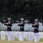 Marines fired three rifle volleys during a burial service at Arlington National Cemetery in August.