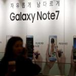 A woman talking on her cellphone walked past an advertisement for the Galaxy Note 7 in Seoul.