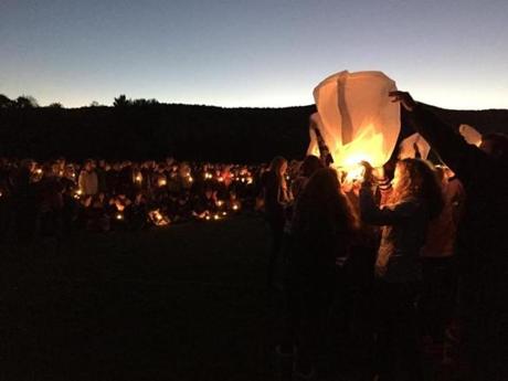 Students at Harwood Union High School in Moretown, Vt. send lanterns into the air during a candle light vigil at the school Monday night to honor of their four classmates and a fifth friend who died Saturday night in a wrong-way crash on Interstate 89. 
