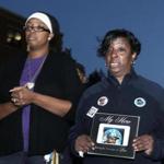 10-11-2016 Roxbury, Mass Family and friends of 9yr.year old who was shot over the weekend in Roxbury, speaking out in front of the Bruce C. Bolling Municipal Building. L. to R. are Youth worker Monica Cannon and LeeAnn Taylor who lost her son Daniel Taylor murdered in 2014. Globe photo by Bill Brett