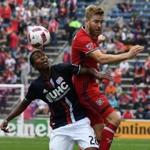 Oct 16, 2016; Chicago, IL, USA; Chicago Fire midfielder Michael de Leeuw (8) and New England Revolution defender London Woodberry (28) head the ball during the first half at Toyota Park. Mandatory Credit: Mike DiNovo-USA TODAY Sports
