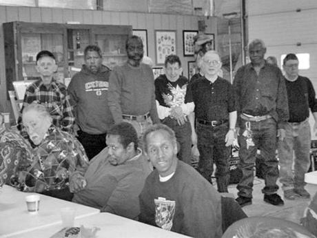 Men with intellectual challenges were exploited at an Iowa turkey plant for decades. They stayed in an old schoolhouse and earned $65 a month, plus room and board. Above: A Christmas party with the men in Atalissa, Iowa.
