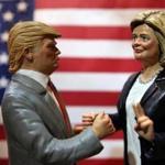 Statuettes depicting presidential candidates Donald Trump (left) and Hillary Clinton were displayed in a shop in Naples, Italy. 