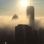 The Boston skyline, as viewed from Cambridge, was enshrouded in fog on Tuesday. 
