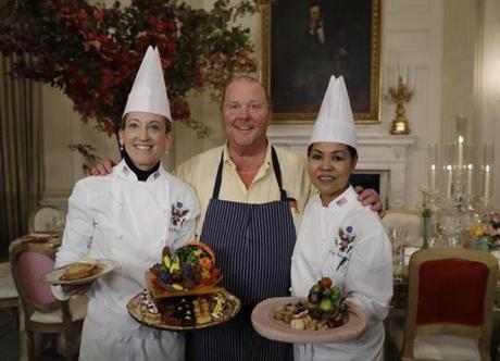 (Left to right): White House Executive Pastry Chef Susan Morrison, chef Mario Batali, and White House Executive Chef Cris Comerford posed before the dinner.
