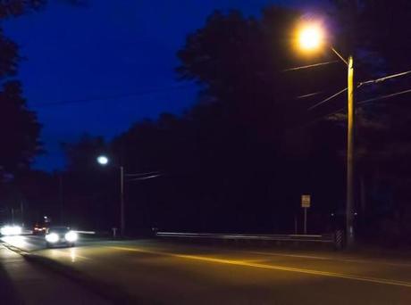 8.3.123270879_Regional_xxsolights The difference in lighting color is evident on Monday, Sept. 26, 2016 in Easton, Mass., from the LED streetlight in the background and the high pressure sodium light in the foreground which is much more orange and less like daylight. Recently the town converted over 1,000 high pressure sodium lights to the more efficient LED street lights. (Robert E. Klein for the Boston Globe)
