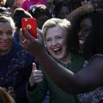 Hillary Clinton took a selfie with early voters Sunday at Chavis Community Center in Raleigh, N.C. 