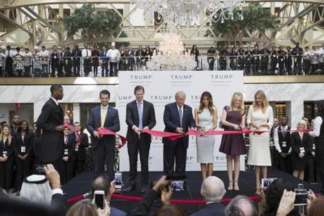Donald Trump with his family during the ribbon cutting ceremony for his Washington, D.C. hotel.
