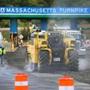 Work started the demolition of the Weston toll booths on the Mass. Pike on Saturday.