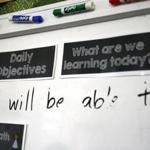 Daily objectives were listed on a whiteboard inside a classroom at Bridge Boston Charter School in Dorchester. 