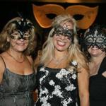 Black and White Masquerade Ball co-chairs (from left) Sandra Schelzi, Lynda Voghel, and Denise Haartz.