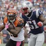 Cincinnati Bengals running back Giovani Bernard runs as New England Patriots linebacker Barkevious Mingo, right, chases during the first half of an NFL football game, Sunday, Oct. 16, 2016, in Foxborough, Mass. (AP Photo/Steven Senne)