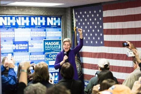 Senator Elizabeth Warren addressed a crowd of canvassers and volunteers as she campaigns in New Hampshire for Hillary Clinton.
