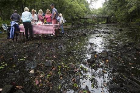 Members of the Ipswich River Watershed Association held a breakfast event in the middle of the river in September to attempt to highlight the effects of the drought. 
