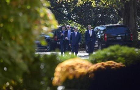 Trump aide Dan Scavino(L) and other members of President-elect Donald Trump's staff arrive at the White House as Trump attends a transition planning meeting with US President Barack Obama on November 10, 2016 in Washington,DC. / AFP PHOTO / JIM WATSONJIM WATSON/AFP/Getty Images

