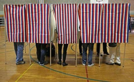Voters filled out their ballots at the Graham and Parks School in Cambridge on Tuesday.
