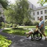 Bobby Campbell, of Alabama, wheeled his daughter, Caroline, through the Prouty Garden at Children?s Hospital following her foot surgery in 2013.