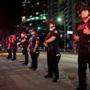 Police officers stood guard during a protest against US President-elect Donald Trump in Miami.