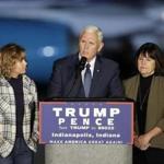 Vice President-elect Mike Pence speaks as he wife, Karen, and daughter, Charlotte, stand next to him during a public rally Thursday, Nov. 10, 2016, in Indianapolis. (AP Photo/Darron Cummings)