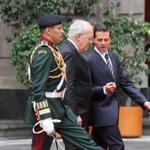 President of Mexico Enrique Peña Nieto, right, and his counterpart from Switzerland, Johann Schneider-Amman, center, during an official welcoming ceremony at the National Palace in Mexico City earlier this month. 