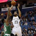 New Orleans Pelicans forward Anthony Davis (23) shoots over Boston Celtics forward Amir Johnson (90) in the first half of an NBA basketball game in New Orleans, Monday, Nov. 14, 2016. (AP Photo/Gerald Herbert)