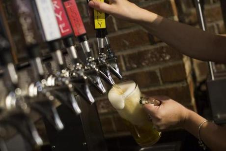 Federal regulators have struck a record-high settlement from a Massachusetts beer distributor.
