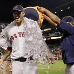 Boston Red Sox starting pitcher Rick Porcello is dunked with ice after a baseball game against the Baltimore Orioles in Baltimore, Monday, Sept. 19, 2016. Porcello pitched a complete game, and Boston won 5-2. (AP Photo/Patrick Semansky)