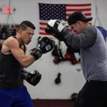 Dorchester.Ma-November 9, 2016-Stan Grossfeld/Globe Staff--- Boxer Gabriel Duluc works out at Grealish Boxing with assistant trainer Gerry Grealish.
