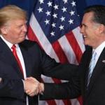Businessman and real estate developer Donald Trump (L) greets U.S. Republican presidential candidate and former Massachusetts Governor Mitt Romney after endorsing his candidacy for president at the Trump Hotel in Las Vegas, Nevada February 2, 2012. REUTERS/Steve Marcus/File Photo