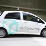  An autonomous vehicle, operated by nuTonomy, is driven during its test drive in Singapore. The Cambridge, Mass.-based startup that makes driverless vehicles, says it will start testing its self-driving cars on public streets in Boston by the end of 2016. (AP Photo/Yong Teck Lim)