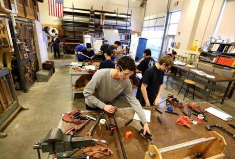 Students worked in the plumbing shop at Worcester Technical High School in 2014. 
