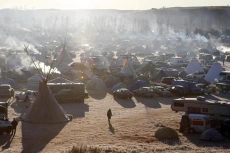 Sun rose over Oceti Sakowin camp Firday in Cannon Ball, N.D., during an ongoing dispute over the building of the Dakota Access pipeline.
