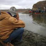 A protester prayed at Standing Rock during the ongoing dispute over the building of the Dakota Access Pipeline.