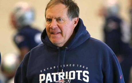 Bill Belichick (pictured at a 2014 practice) is raffling off luxury suite tickets, autographed hoodies, and more to benefit his foundation.
