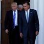 U.S. President-elect Donald Trump (L) and former Massachusetts Governor Mitt Romney emerge after their meeting at the main clubhouse at Trump National Golf Club in Bedminster, New Jersey, U.S., November 19, 2016. REUTERS/Mike Segar/File Photo