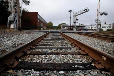 10/28/2016 - Boston, MA - October 28, 52016: Train tracks cross Brighton St. in Belmont, MA on October 28, 2016. It is here that David J. Haverty was struck by an MBTA commuter train in 2009. (The widow and five grown children of the late David J. Haverty of Belmont refuse to give up their quest to do one last thing in his memory: To fix his death certificate so that it no longer contain the word 