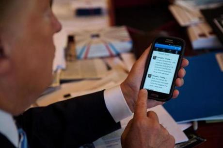 Donald Trump showed off the Twitter app on his phone during a meeting in Trump Tower last year.
