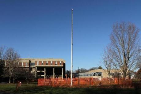 11/28/16-AMHERST, MA - Snow fencing has been put around the empty flag pole at Hampshire College. (Joanne Rathe/ Globe Staff) topic: : section: metro
