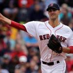 Boston, MA - 7/09/2016 - (4th inning) Boston Red Sox starting pitcher Rick Porcello (22) throws to first base while holding the baserunner during the fourth inning. The Boston Red Sox take on the Tampa Bay Rays in Game 2 of a 3 game series at Fenway Park. - (Barry Chin/Globe Staff), Section: Sports, Reporter: Peter Abraham, Topic: 10Red Sox-Rays, LOID: 8.2.3560302149.