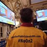 A supporter of public schools watched election results on Nov. 8 at the Fairmount Copley Plaza hotel in Boston.